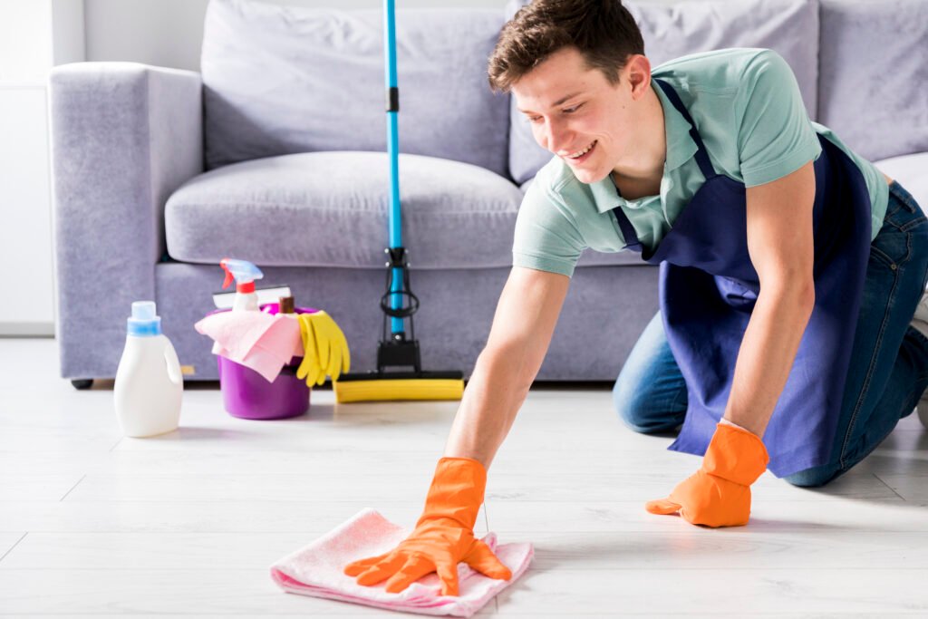 man cleaning his home